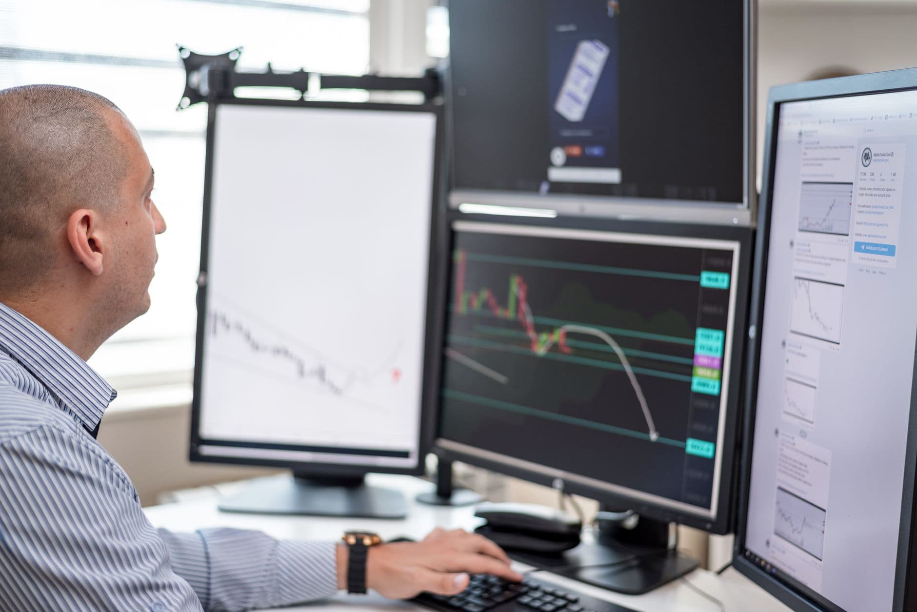 Freight broker workstation with multiple screens showing outbound campaign data
