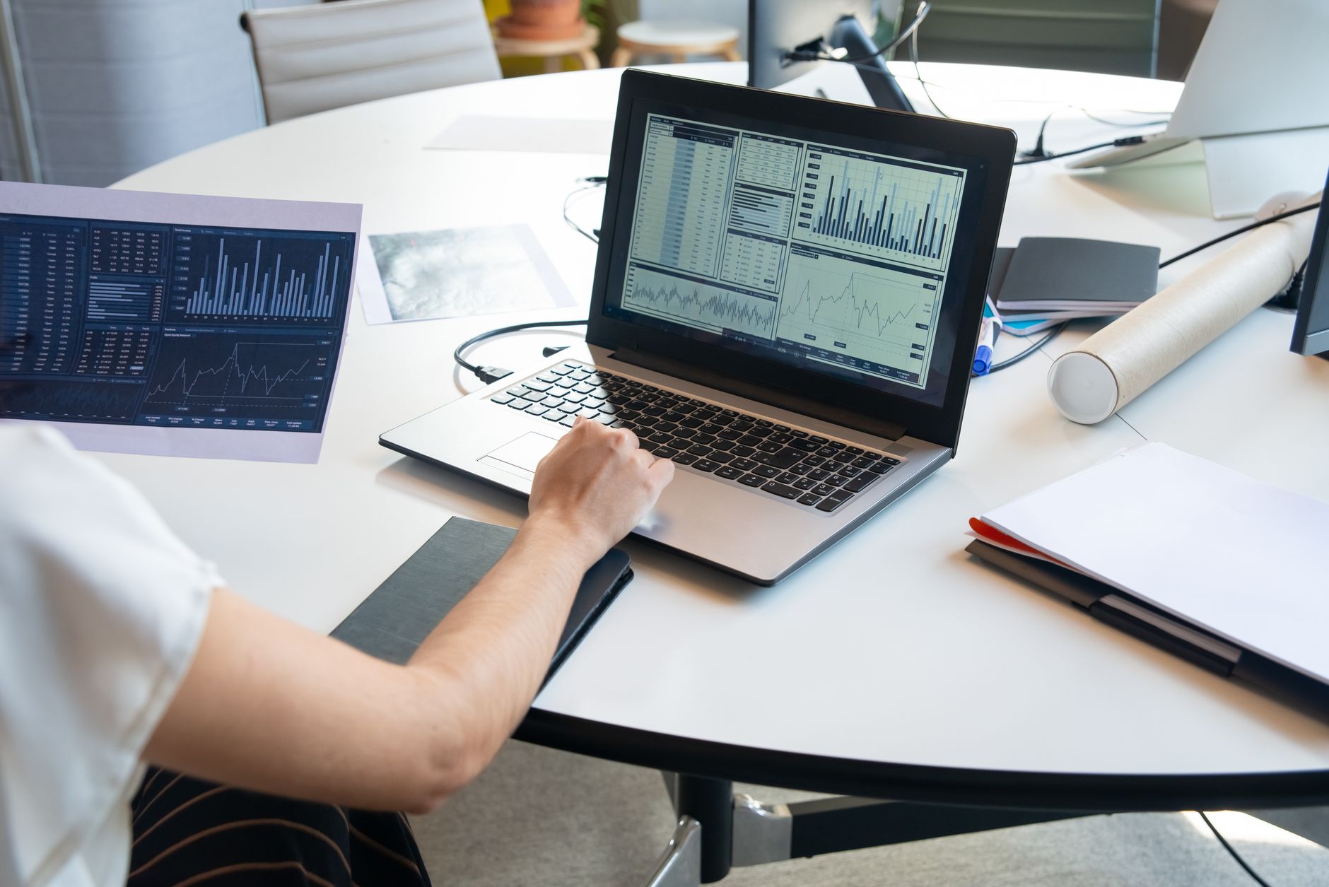 Logistics operator reviewing shipment tracking data on a computer screen