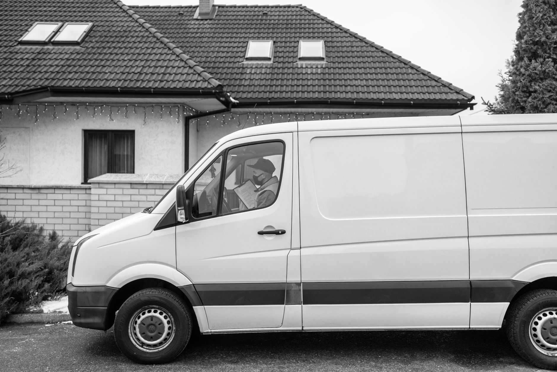 HVAC service van parked in a residential driveway ready for a job